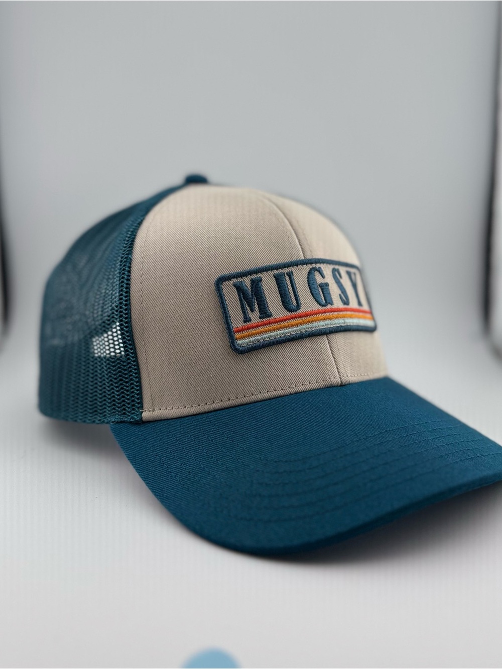 Mugsy Two-Tone Trucker Hat – Teal and Beige